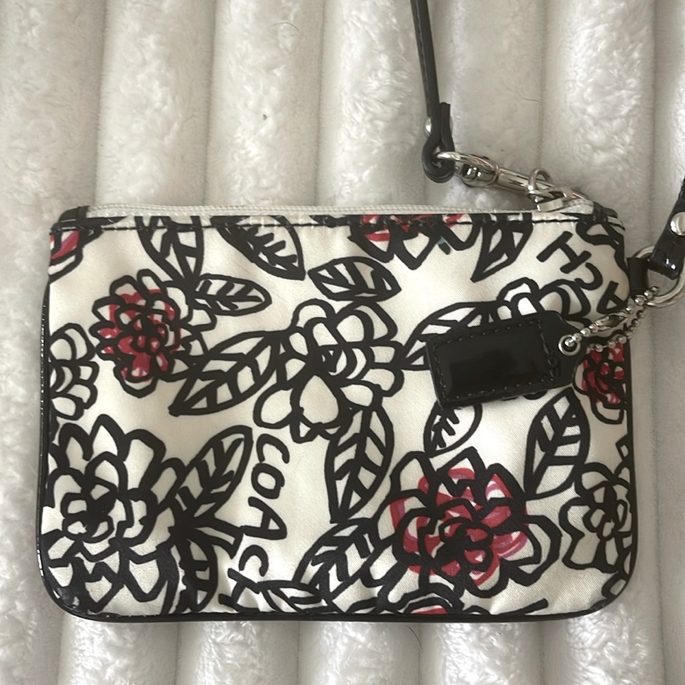 Coach Poppy Floral Wristlet with Black and Red Accents EUC
No Callouts - Picture 3 of 10
